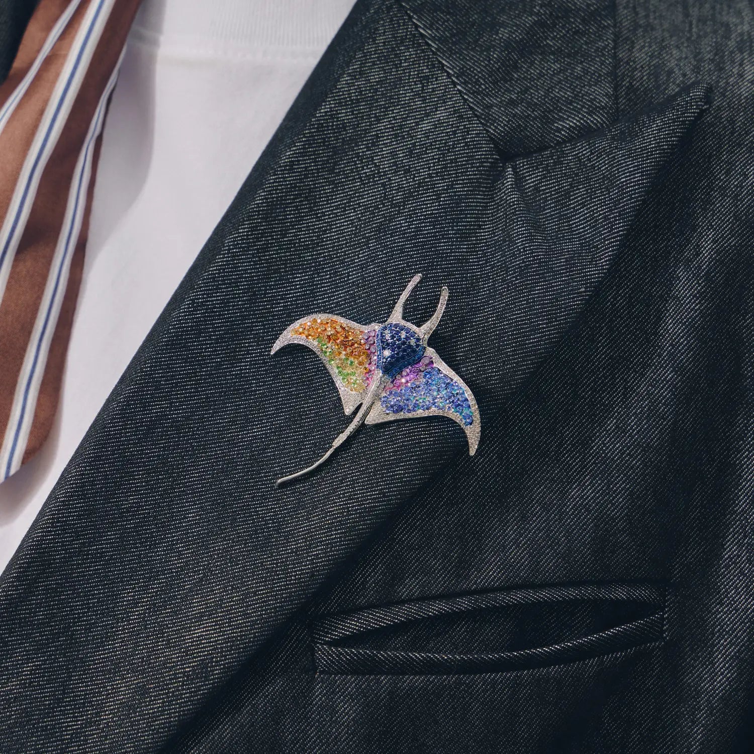 Aurora Manta Ray brooch styled on a blazer