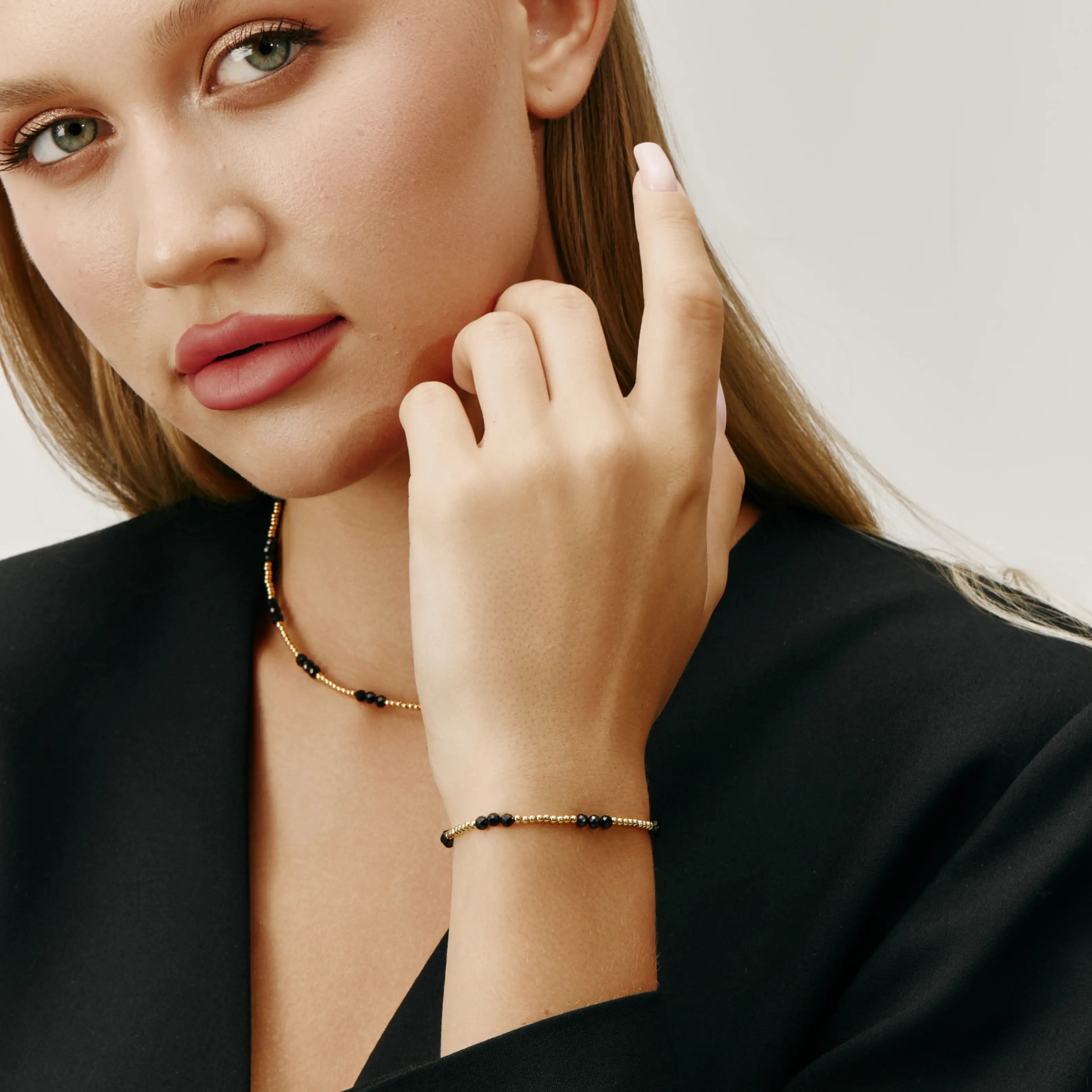 Noir Bracelet Black Beaded and Gold-Tone Chain Bracelet